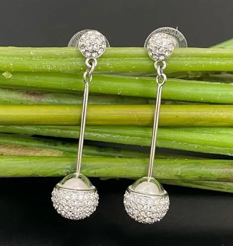 Swavorski Discontinued SWAROVSKI Swan Signed Dolce Silver Pave Crystal Drop Earrings 9g.