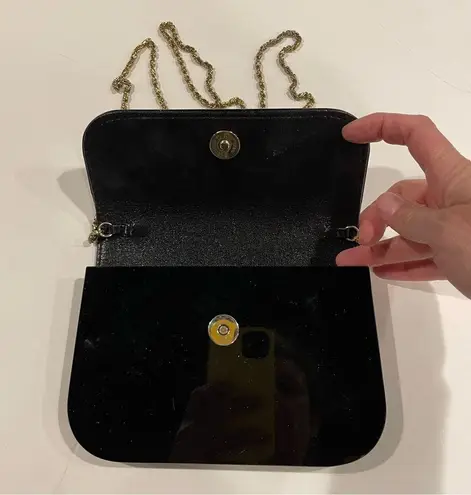 Adorable vintage leucite black gold handbag 70’s