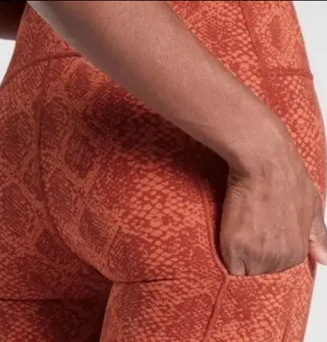 Athleta  Ultimate Snake Print Leggings 7/8 Length Red Orange Sz XS Excellent Condition 