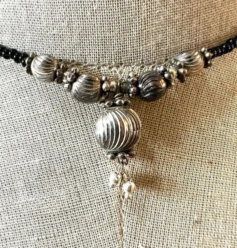 Black beaded silver tone choker necklace