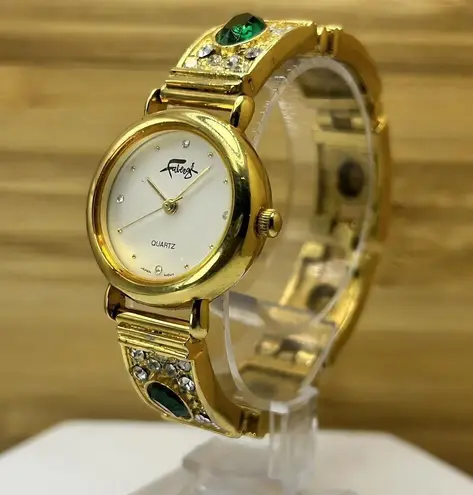 Rhinestone Watch by Faberge Gold Tone Stainless with Green and White Gemstones Size 6