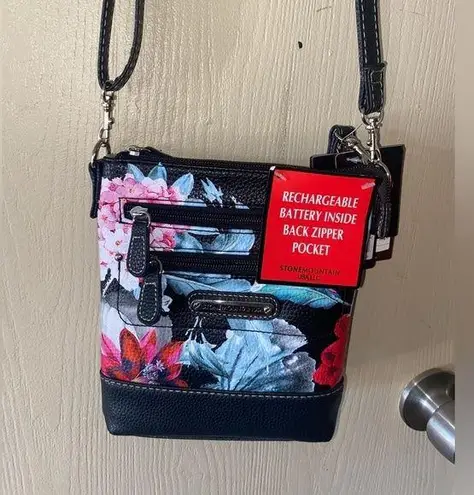 The Mountain _Stone’s floral leather crossover w/ rechargeable battery pack i…