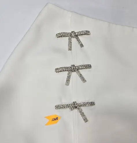 MORE TO COME Ember Mini Skirt in White Size L