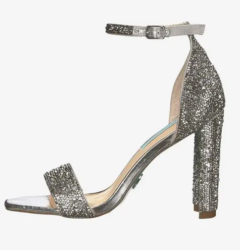 Betsey Johnson heels /women silver in color size 7.5 gorgeous elegant.