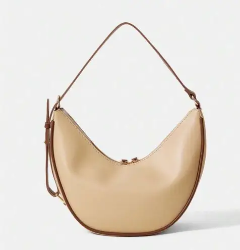 Beige handbag shoulder bag purse with brown contrast lining