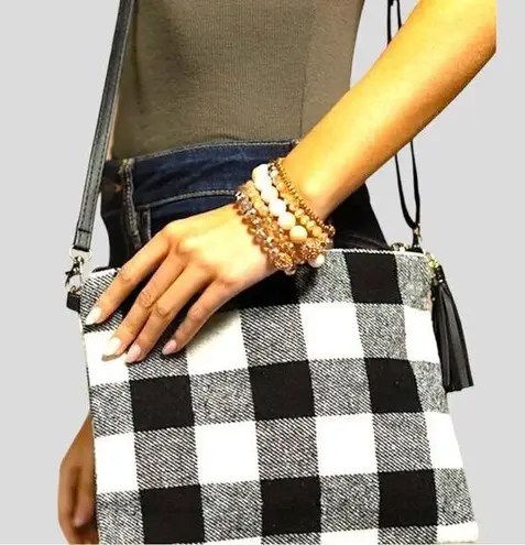 Best of everything brand black and white buffalo plain shoulder bag or wristlet