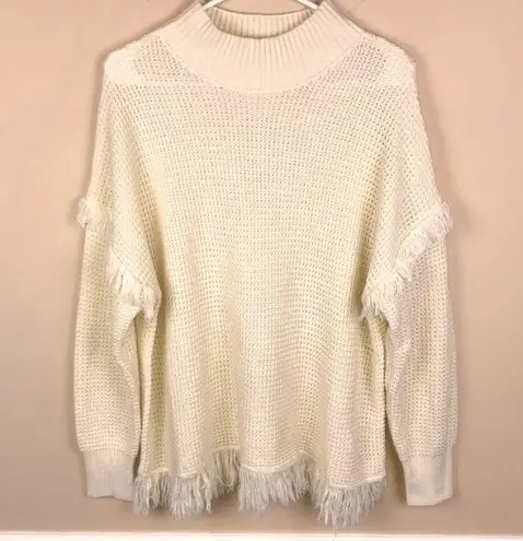 Umgee  Women’s Waffle Knit Fringe Sleeve Hem Detail Mock Neck Cream Sweater