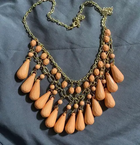 Coral stunning beaded necklace , pair your items up with jeans , dresses, skirts Orange