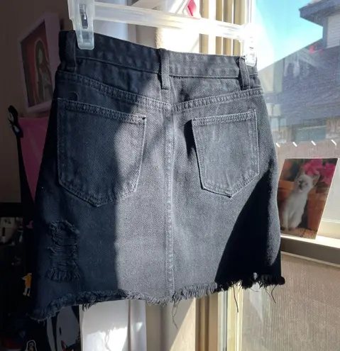 Distressed Black denim mini skirt Size XS