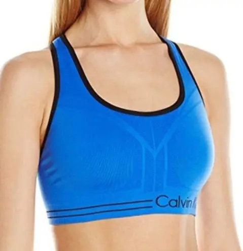 Calvin Klein Blue and black reversible sports bra never worn