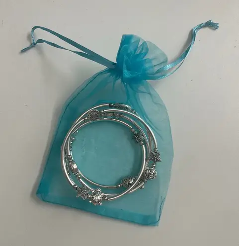 Swirly Bracelet Sea Charms Turtle Starfish Shell Flower Leaf Sun Silver Stretch - Image 1