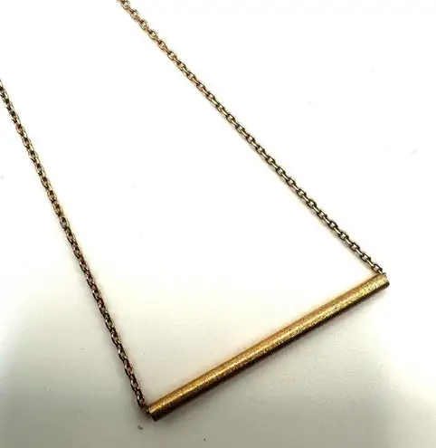 The Bar Gold tone pendant necklace