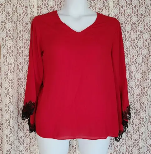 Est. 1946  red black bell sleeve blouse with lace detail