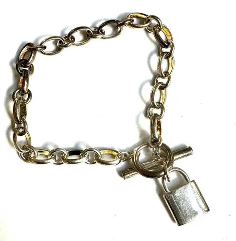 Silver tone locket charm bracelet