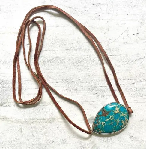 Turquoise tone side cord pendant necklace