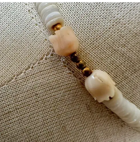 Puka shell with carved rose beaded necklace