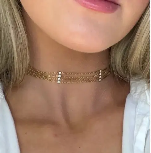 MULTILAYER CHOKER LINKED BY DIAMOND SIMULANT STONES Gold