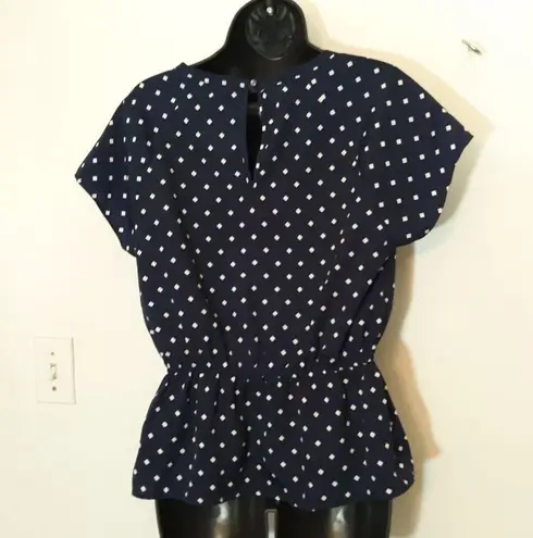 Valerie Bertinelli navy polka dot blouse