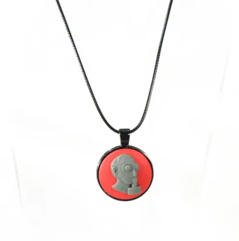 Unisex Punk Pendant on Black Toned Metal with Black Waxed Cord Red