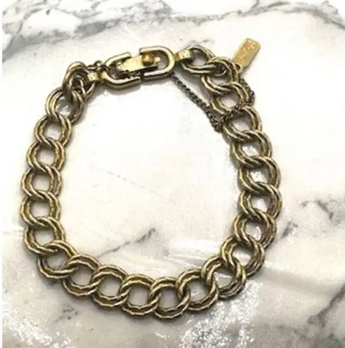 Monet  gold tone vintage link bracelet with safety chain