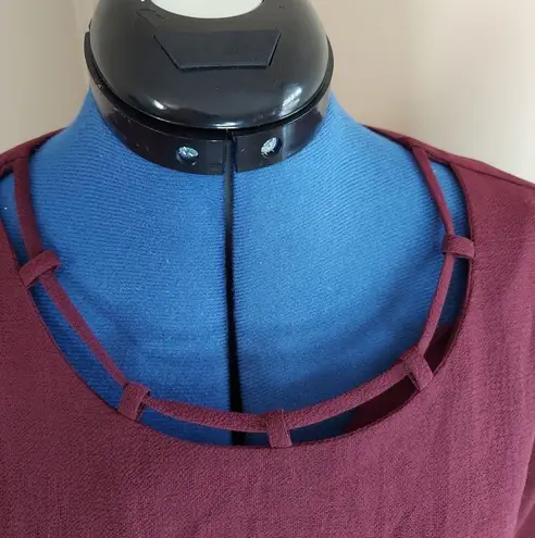 Alice Blue Garnet Blouse with cut out details and keyhole back