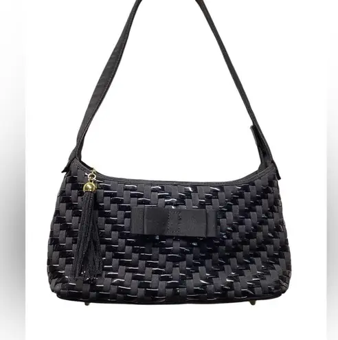 Nylon and vinyl weave purse. Great size with multiple separations. Black