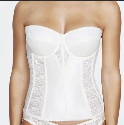 Dominique Colette Lace Corset Elegant lace trim adds a romantic touch to this full-length