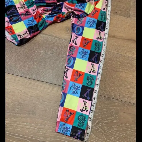 Deep plunge neck colorful bodysuit size L Size L