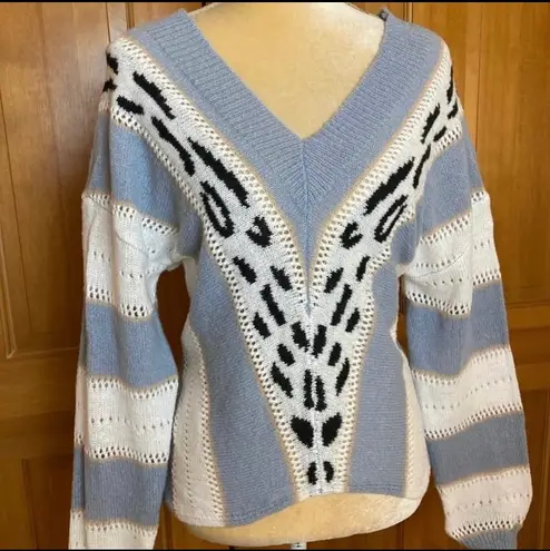 Lavishly Paris NWT, Leopard Designer Drop Shoulder Sweater.