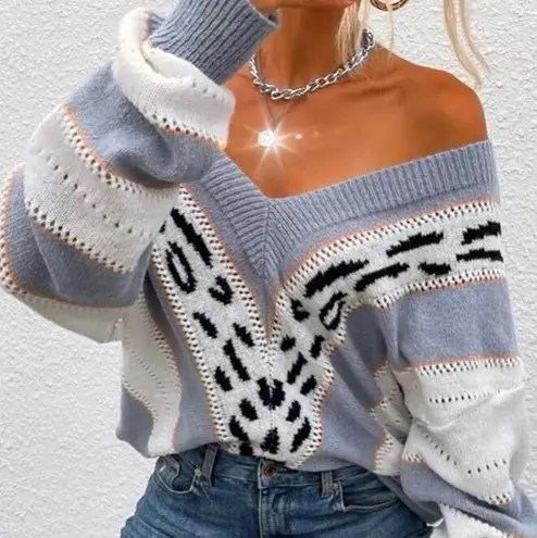 Lavishly Paris NWT, Leopard Designer Drop Shoulder Sweater.