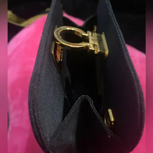 Salvatore Ferragamo Black and Gold convertible with Signature Clasp