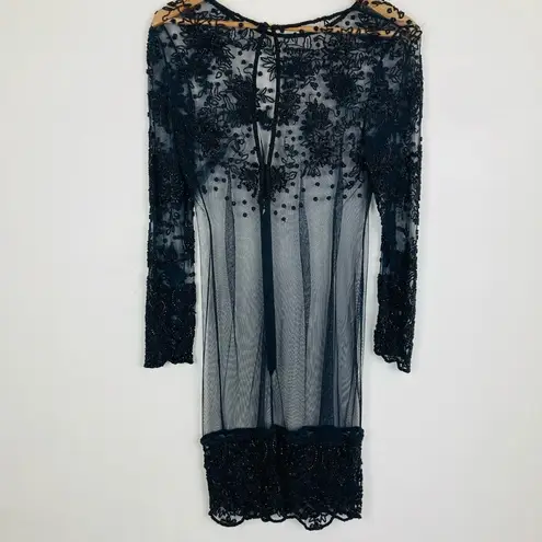 Naeem Khan’s vintage 90s Riazee Boutique floral beaded black cocktail dress. 4