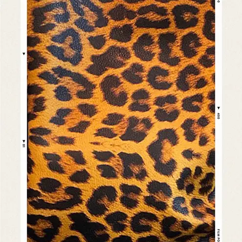 Leopard print with fringe crossbody purse with adj strap 10”x13” leather Brown