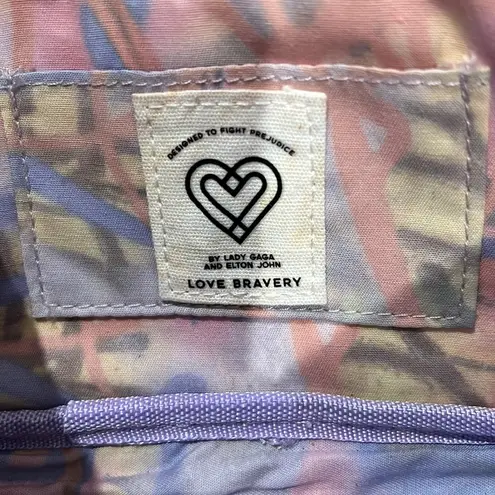 Cosmetic pouch in cat eye shape. Love Bravery by Lady Gaga and Elton John Black