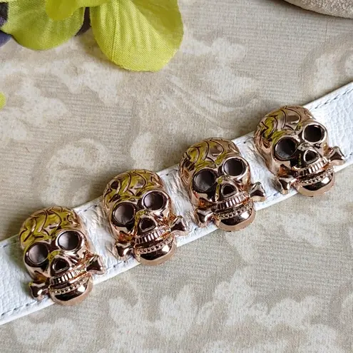 White Leather Stop Bracelet w/ Gold Skulls