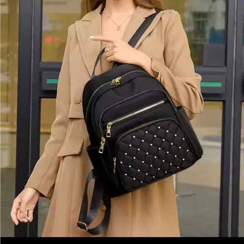 Elegant Black Quilted Backpack