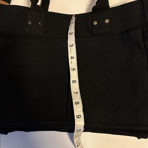 Black Canvas Tote Bag Brown Accents Detachable Strap 6 Pockets Outside on Bag