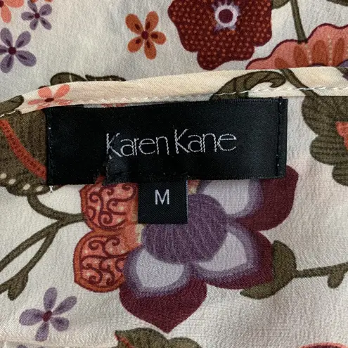 Karen Kane ivory, rust and purple floral print dolman sleeve semi sheer blouse M