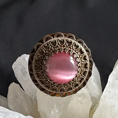 Unique resin & goldtone filigree EUC ring. Imitation pink cat’s eye center stone