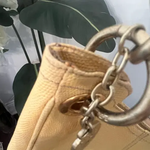 Brahmin yellow/white hobo style shoulder bag. Gold hardware.Rare light yellow