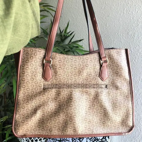 GUESS brown and tan tote monogram hand shoulder bag purse. Some wear as pictured. Great for work school college university. Can fit most books laptops. - Image 2
