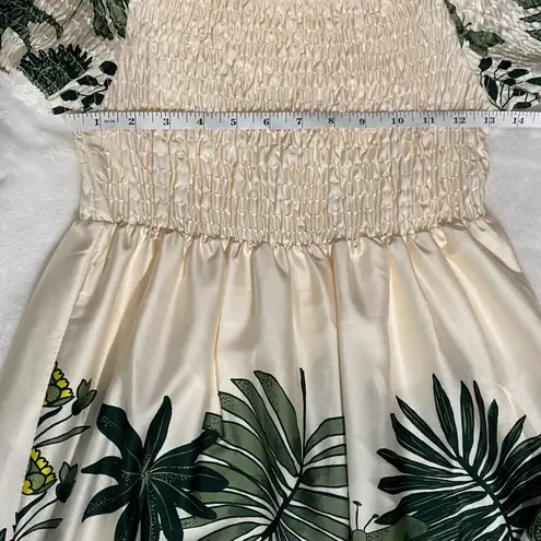 Coolples Made in Italy maxi dress featuring a smocked bodice, short sleeves. Size L