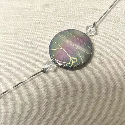 Silver tone abalone disc necklace