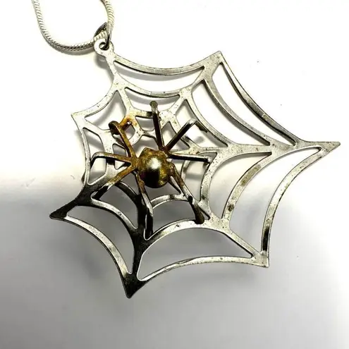 Two tone spider web pendant necklace Silver