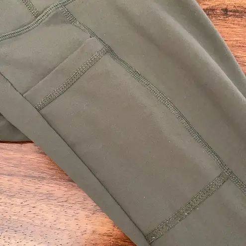 Senita Athletics Army Green Criss Cross Crop Leggings Size Small Cropped EUC