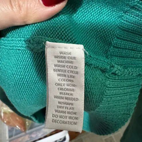 Charter Club  green V-neck sweater with a gold-tone toggle closure.