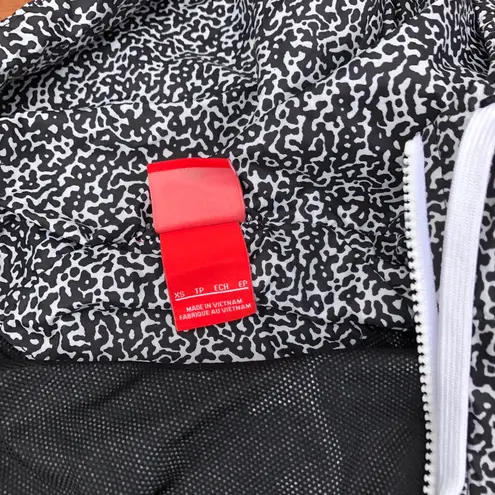 Nike leopard print windbreaker hot sale
