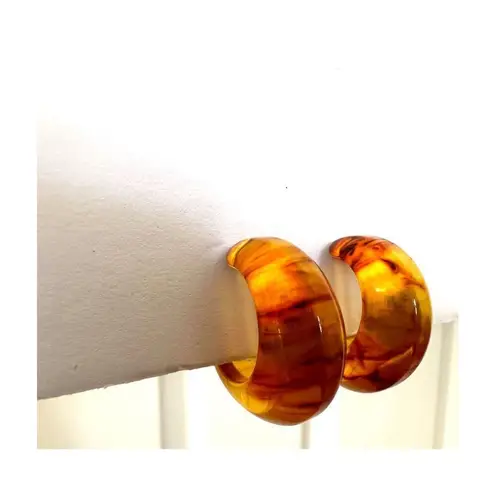 translucent root beer bakelite vintage hoop earrings Orange