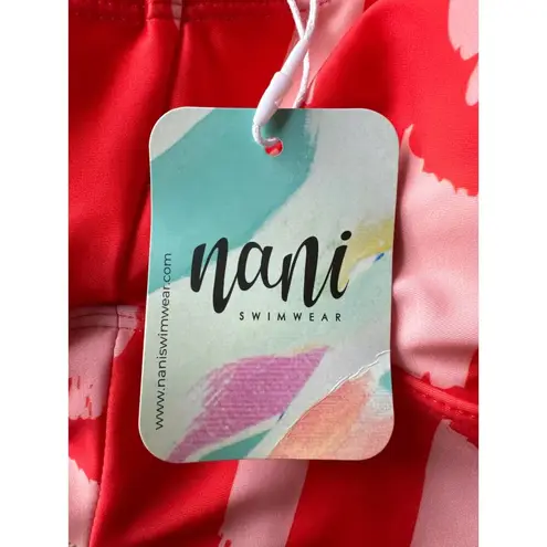 NWT Nani paintbrush surf crop orange and white size large