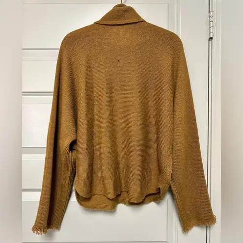 Vince  Fringe Cuff Dolman Sleeve Turtleneck in a Carmel brown color